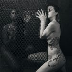 Caged Animal -  Ashley Johnson &  Jessica Shifflett & Lourenso Ramautar Boudoir Photography